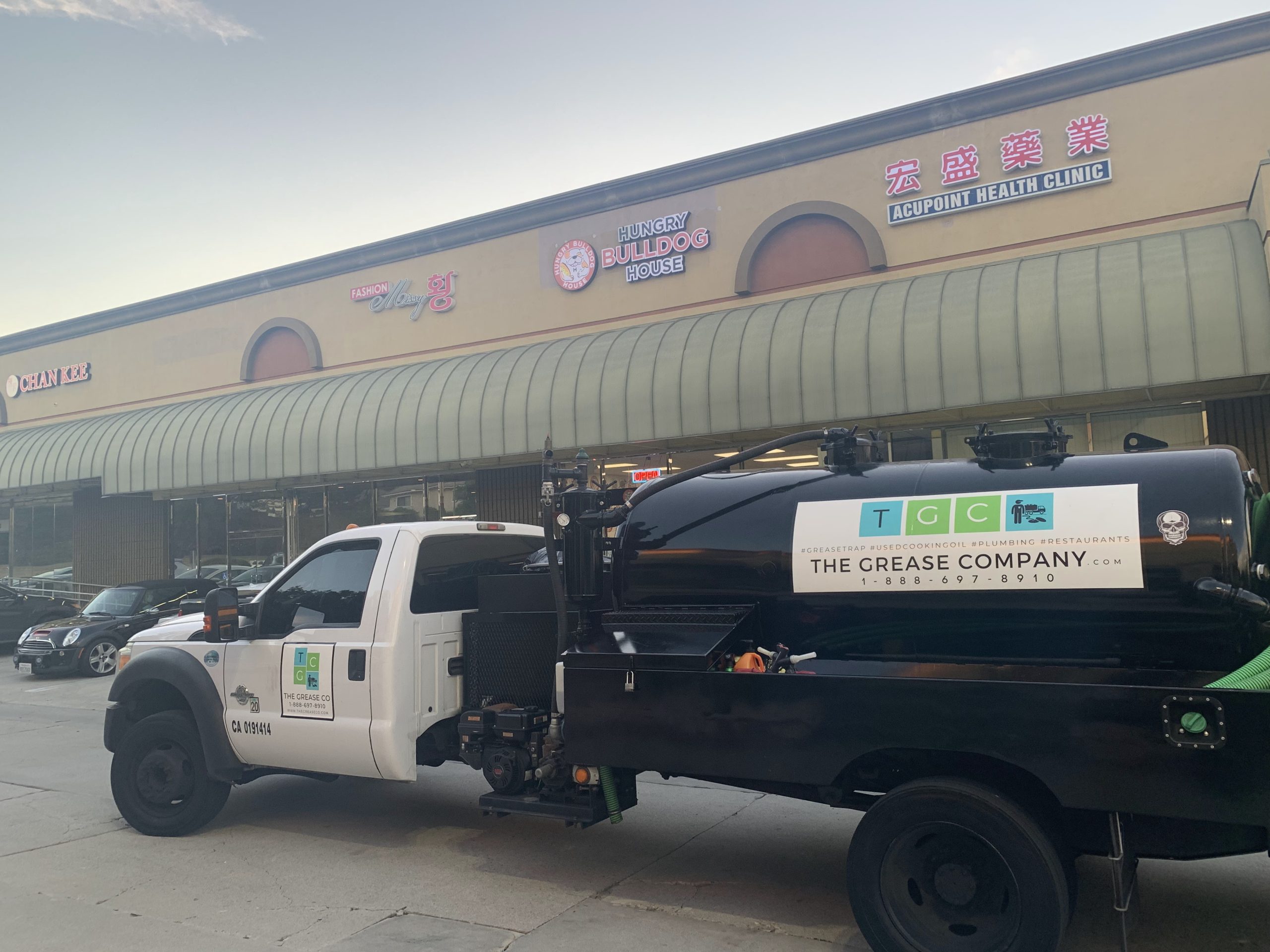 A fully equipped service vehicle used by The Grease Company for grease trap repair and maintenance.