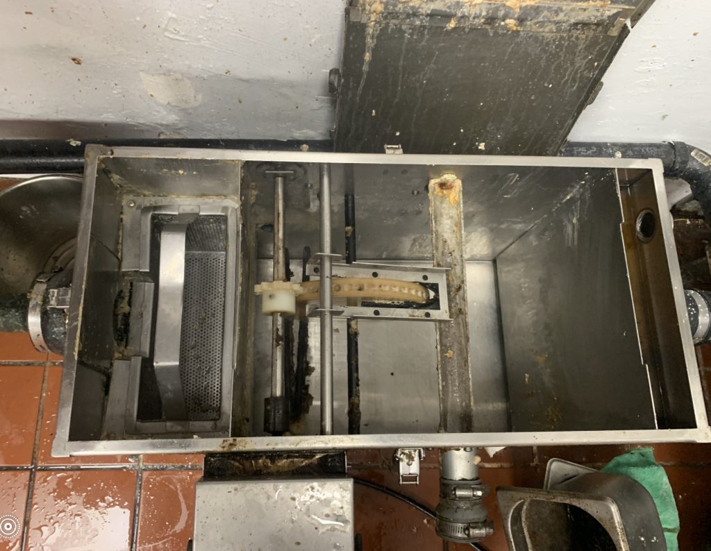 clean grease trap after professional grease trap cleaning in Los Angeles commercial kitchen