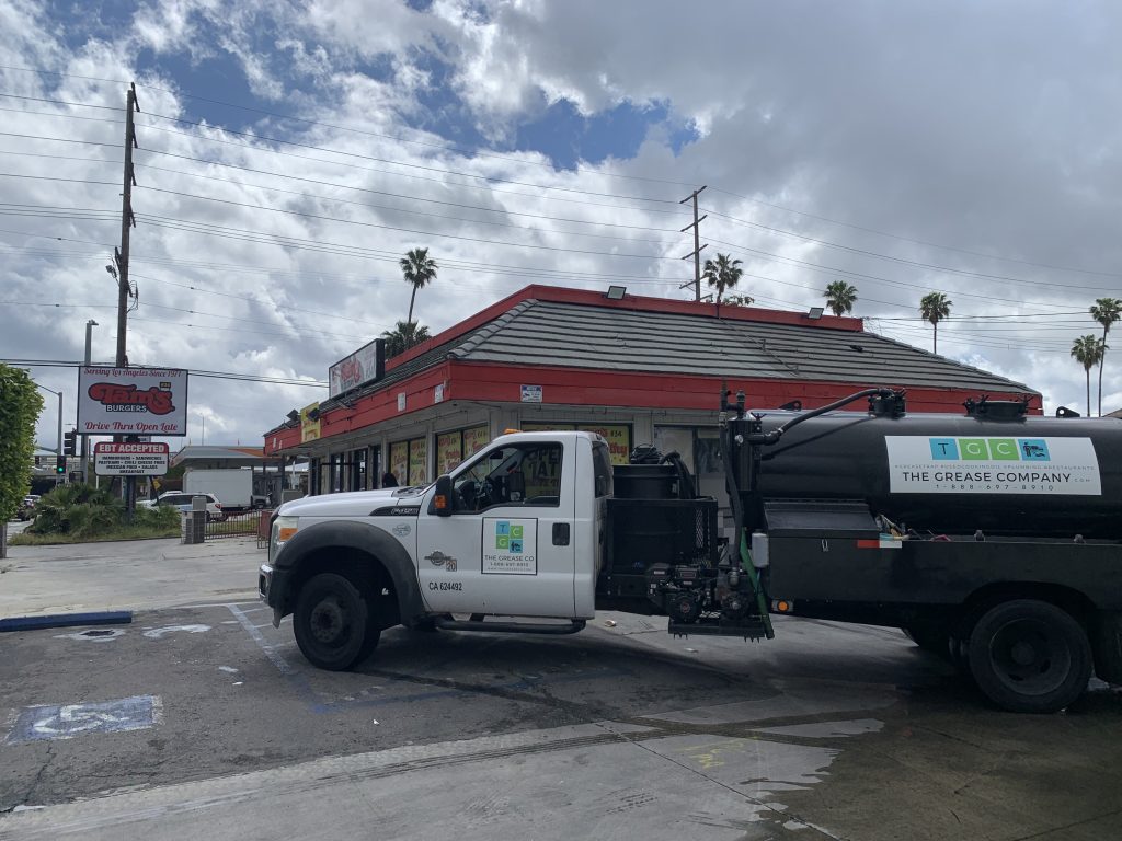 Commercial grease trap service team servicing restaurant in Los Angeles