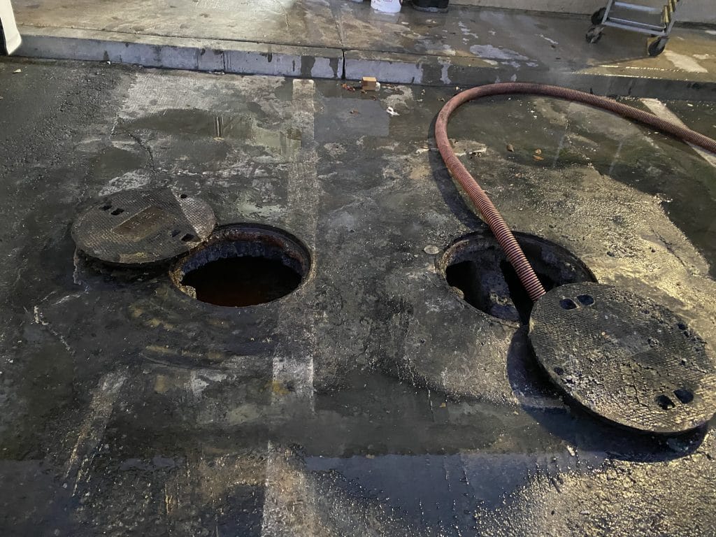 grease interceptor cleaning service in Los Angeles restaurant removing grease and wastewater buildup