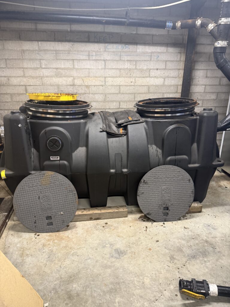 large underground grease interceptor system at commercial property in Los Angeles
