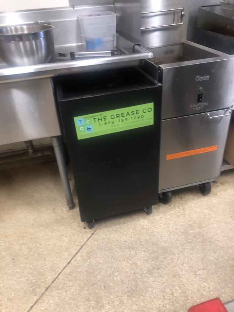 grease trap installed under commercial kitchen sink in Los Angeles restaurant
