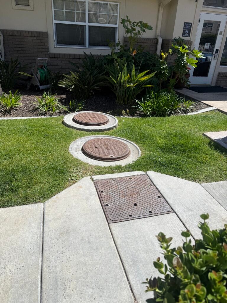 grease interceptor lids closed in restaurant backyard Los Angeles
